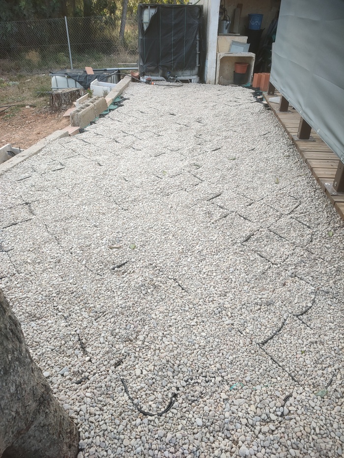 Laying the Geocelda Matting and filling with Stones